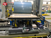 Steel wire compression and wrapping machine