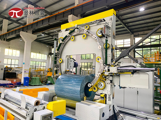 Steel wire compression and wrapping machine