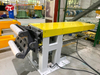 Steel wire compression and wrapping machine